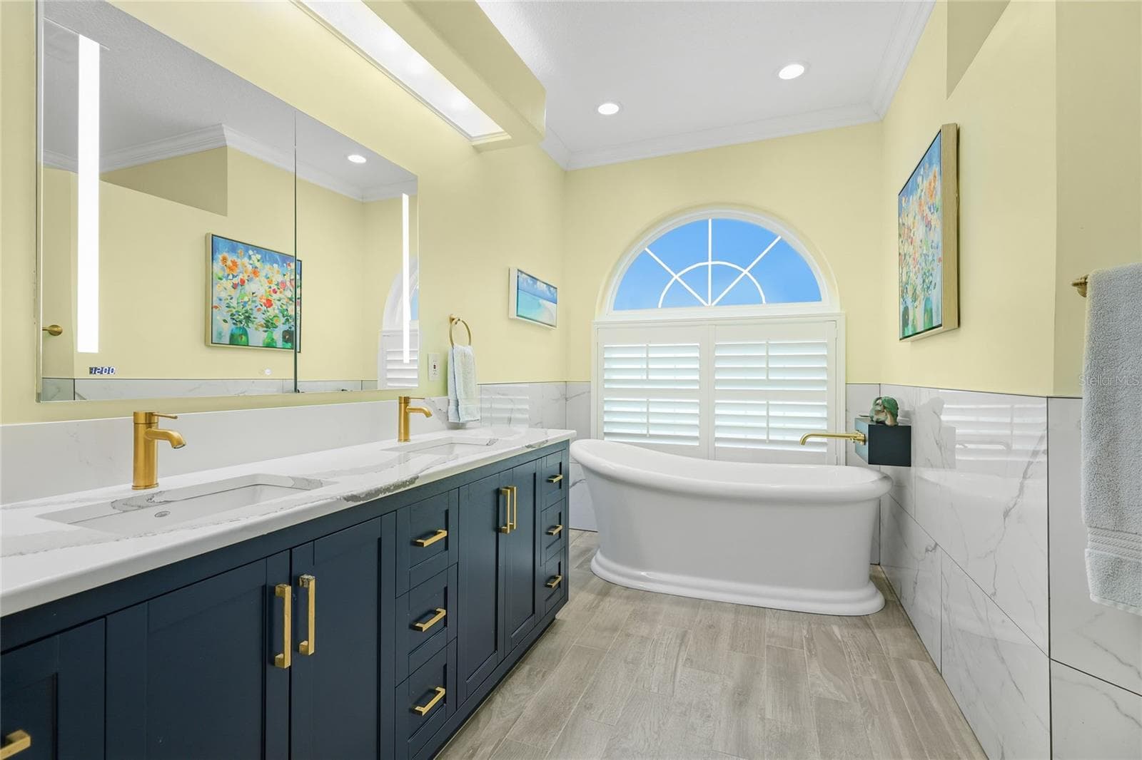 Primary en-suite has been completely renovated, featuring a slipper tub, updated plumbing & fixtures, new vanity cabinet, Toto toilet, and walk-in shower - 3306 LITTLE COUNTRY RD, PARRISH