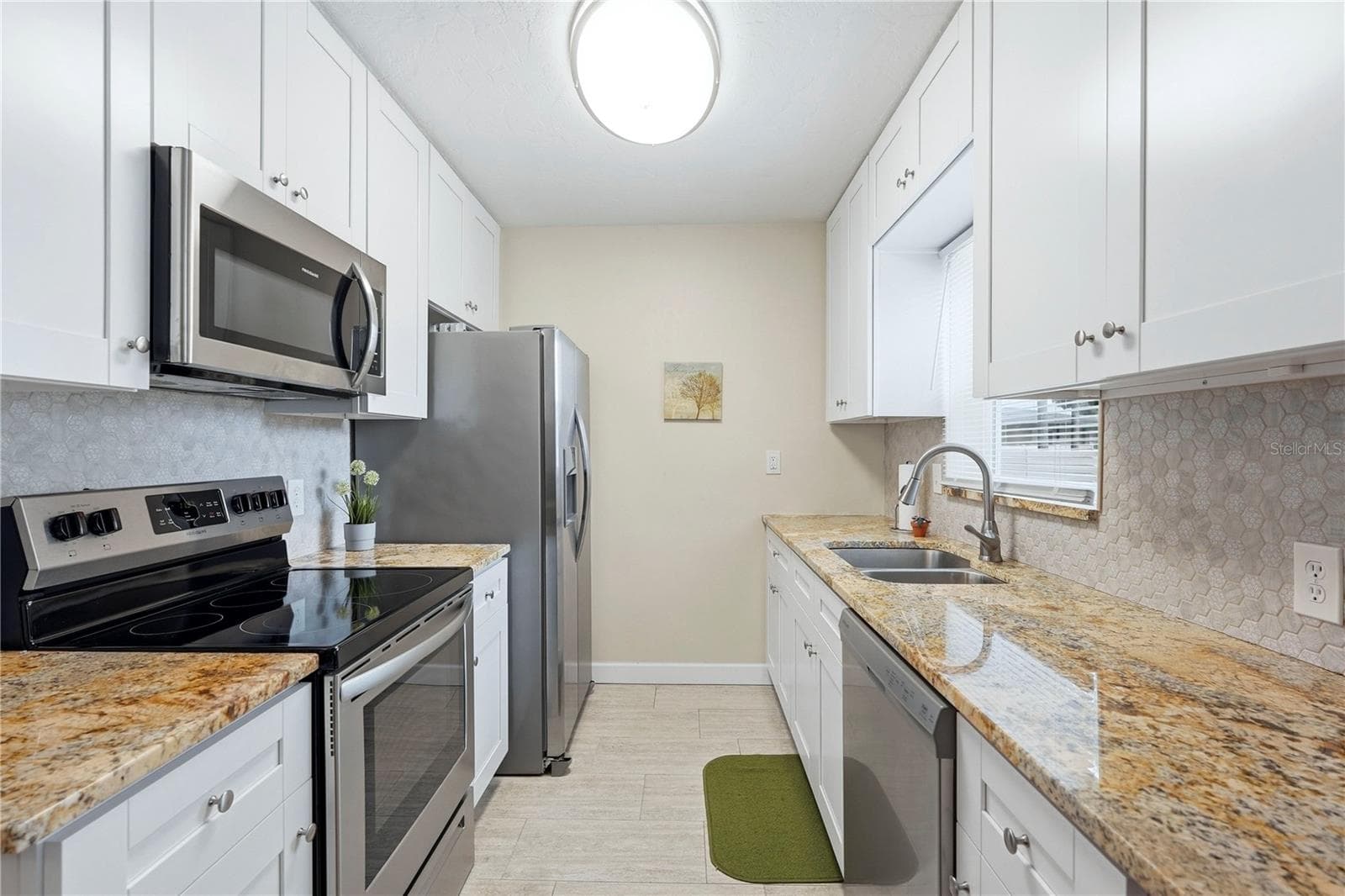 Granite Counters, Shaker Cabinets, Tile Backsplash - 4567 25TH AVE N, ST PETERSBURG