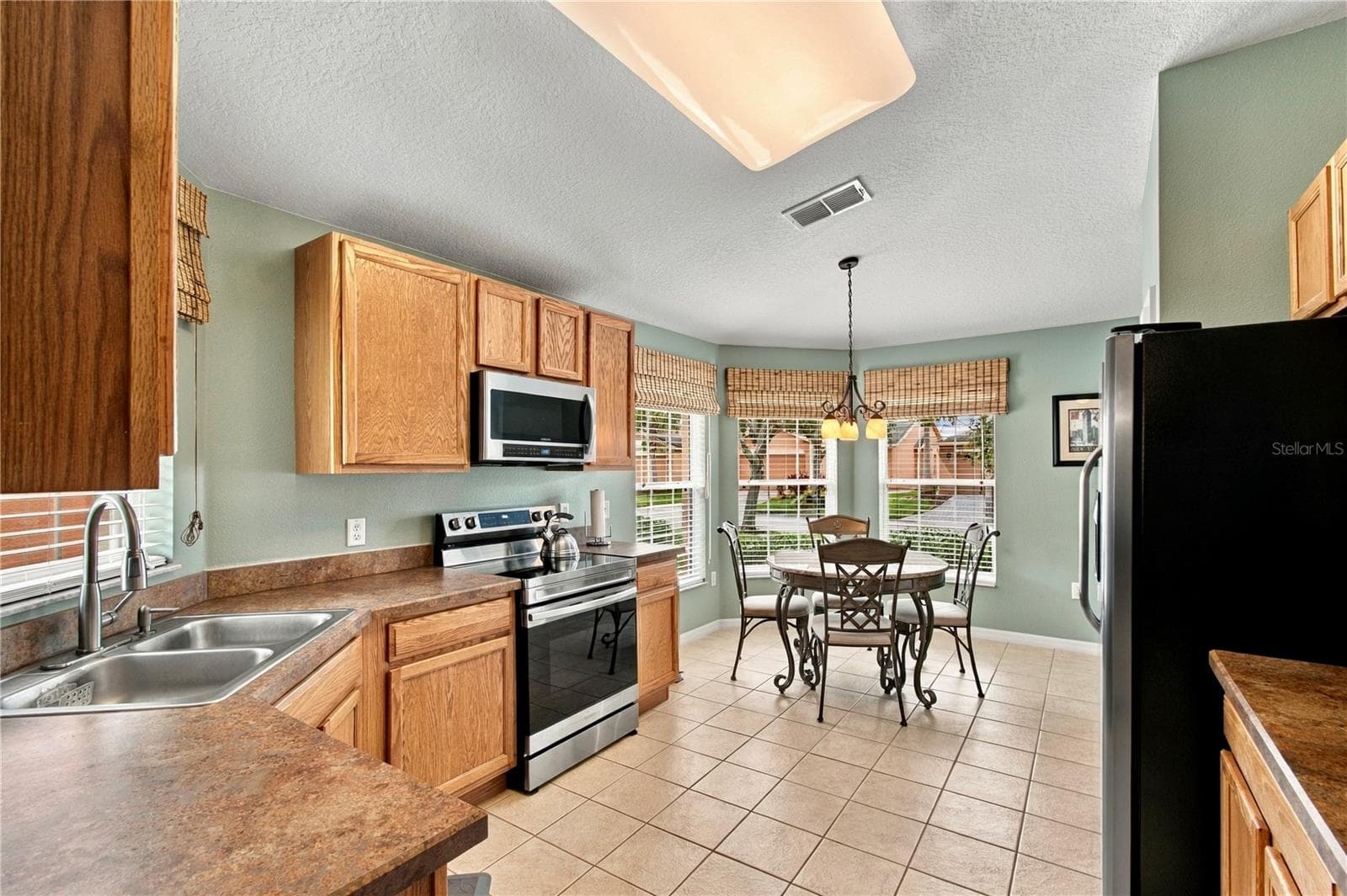 CERAMIC TILE FLOORS - 516 GRAND CANAL DR, POINCIANA