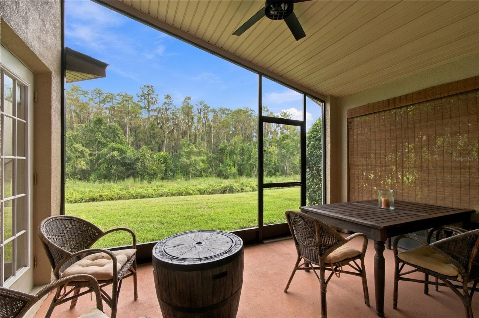 SCREENDED AND COVERD LANAI - 516 GRAND CANAL DR, POINCIANA