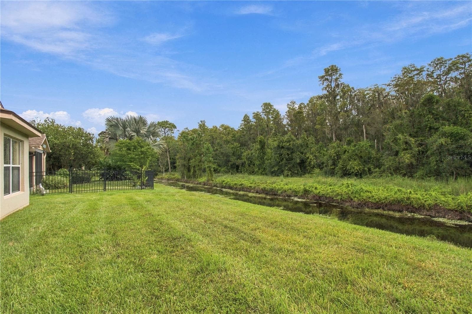 CANAL AND CONSERVATION VIEWS!! - 516 GRAND CANAL DR, POINCIANA