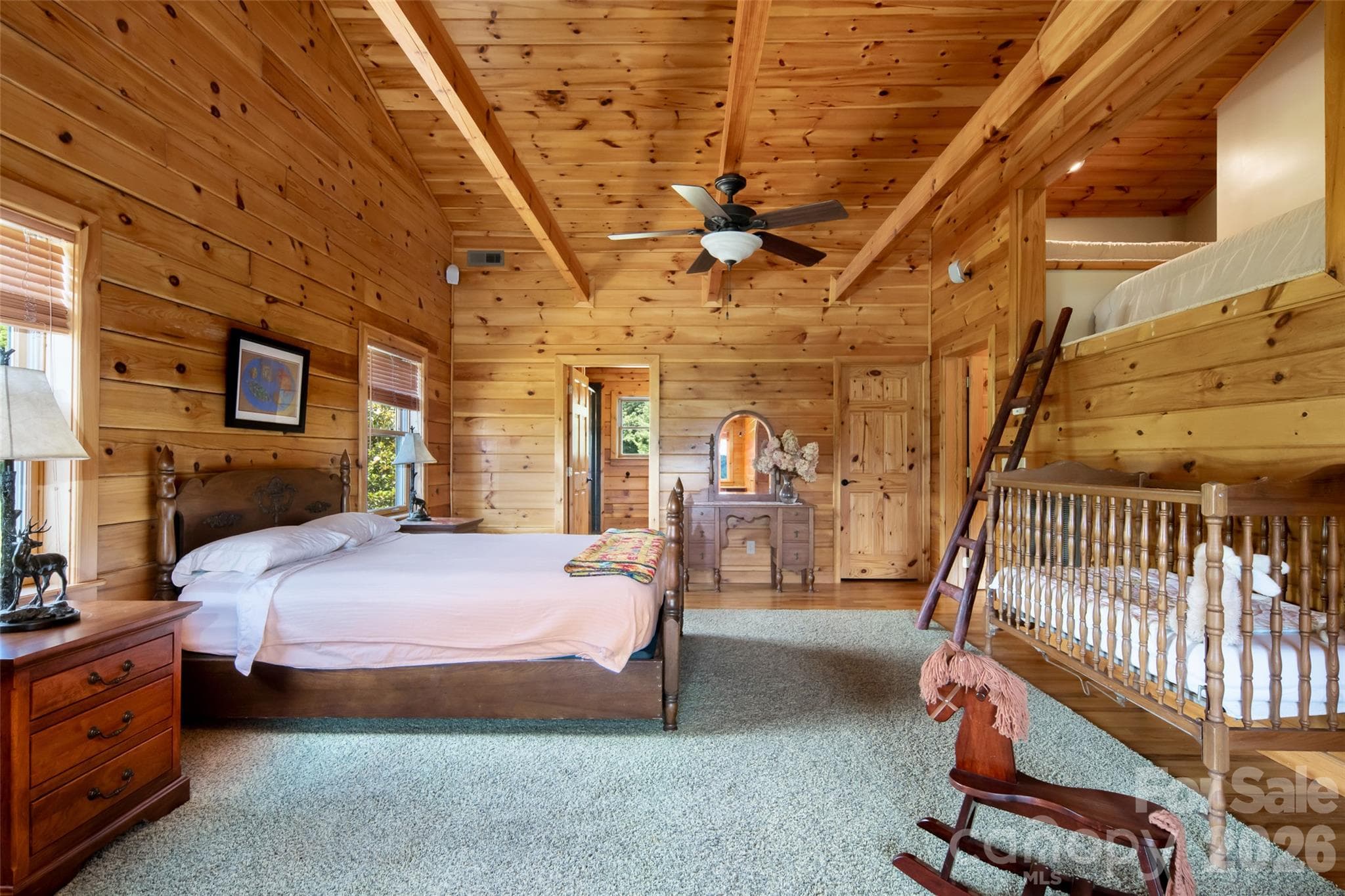 Second bedroom upstairs with an en-suite full bathroom and a hide-away loft bed, up a fun ladder. - 316 Stevenson Cove Road, Waynesville