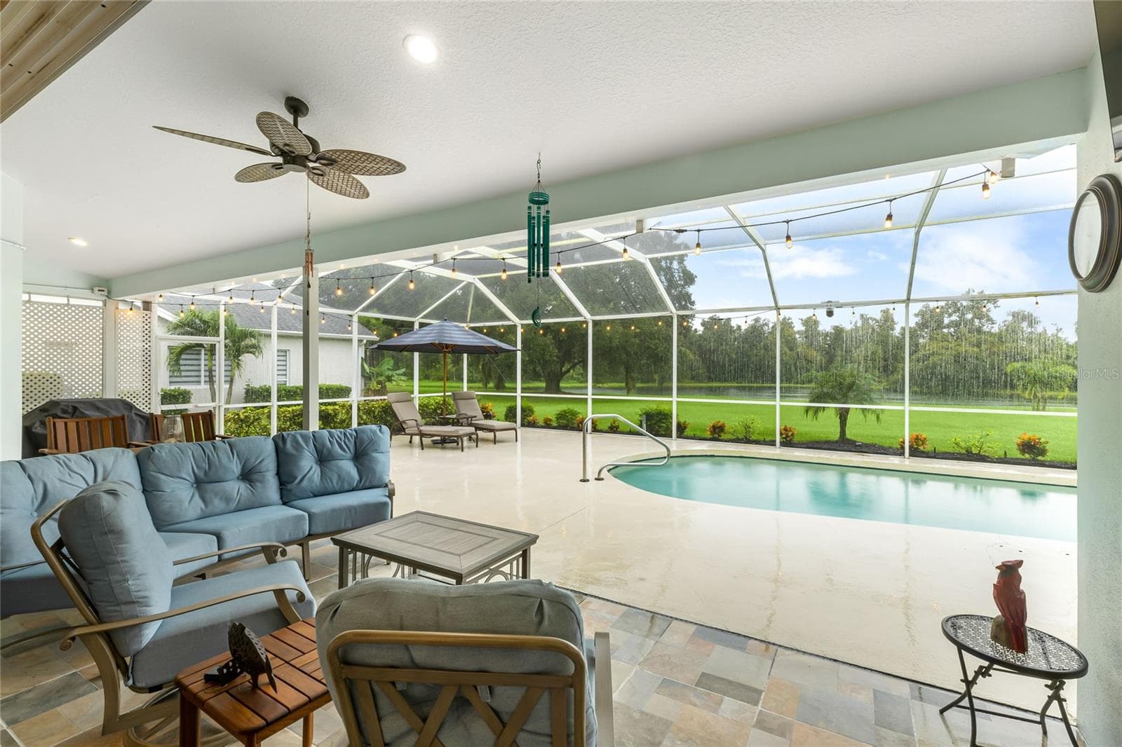 Covered lanai with completely screened in-ground pool - 3306 LITTLE COUNTRY RD, PARRISH