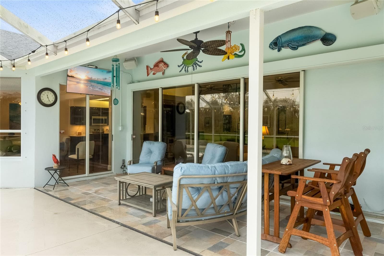 Entertain on the patio or watch the game on the wall mounted TV - 3306 LITTLE COUNTRY RD, PARRISH