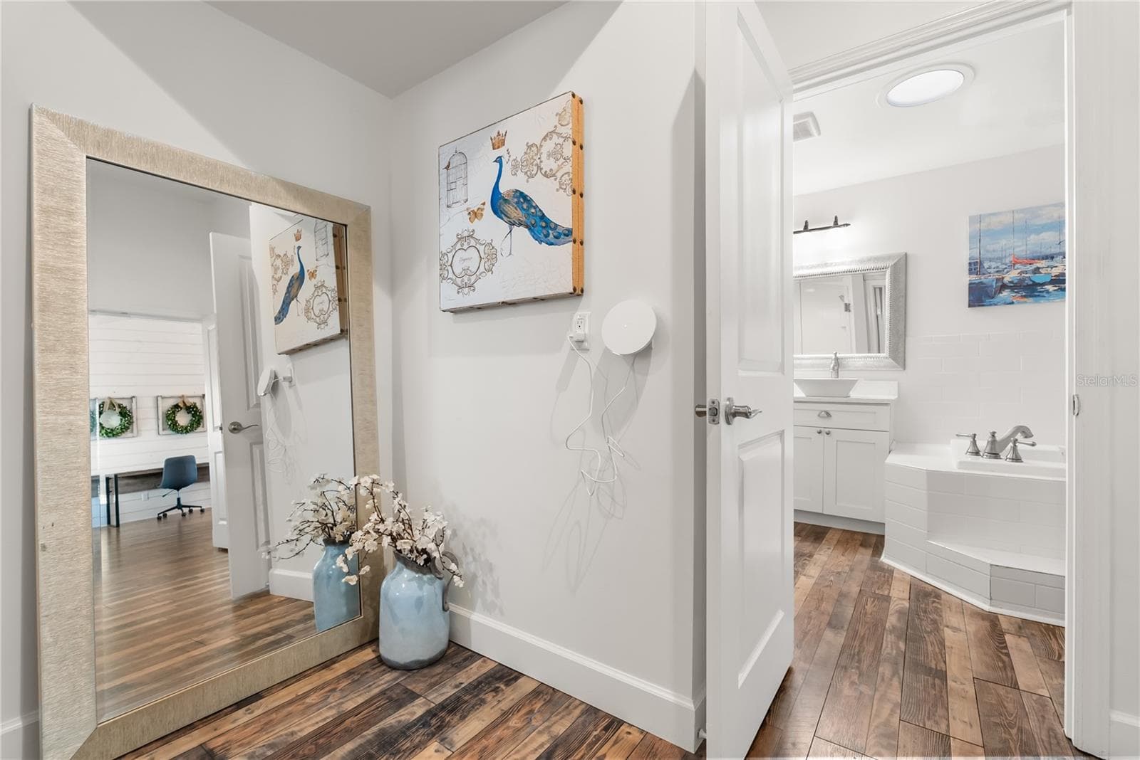 Master suite entrance with access to laundry room, ensuite bathroom and walk in closet - 2707 S ATLANTIC AVE, DAYTONA BEACH SHORES