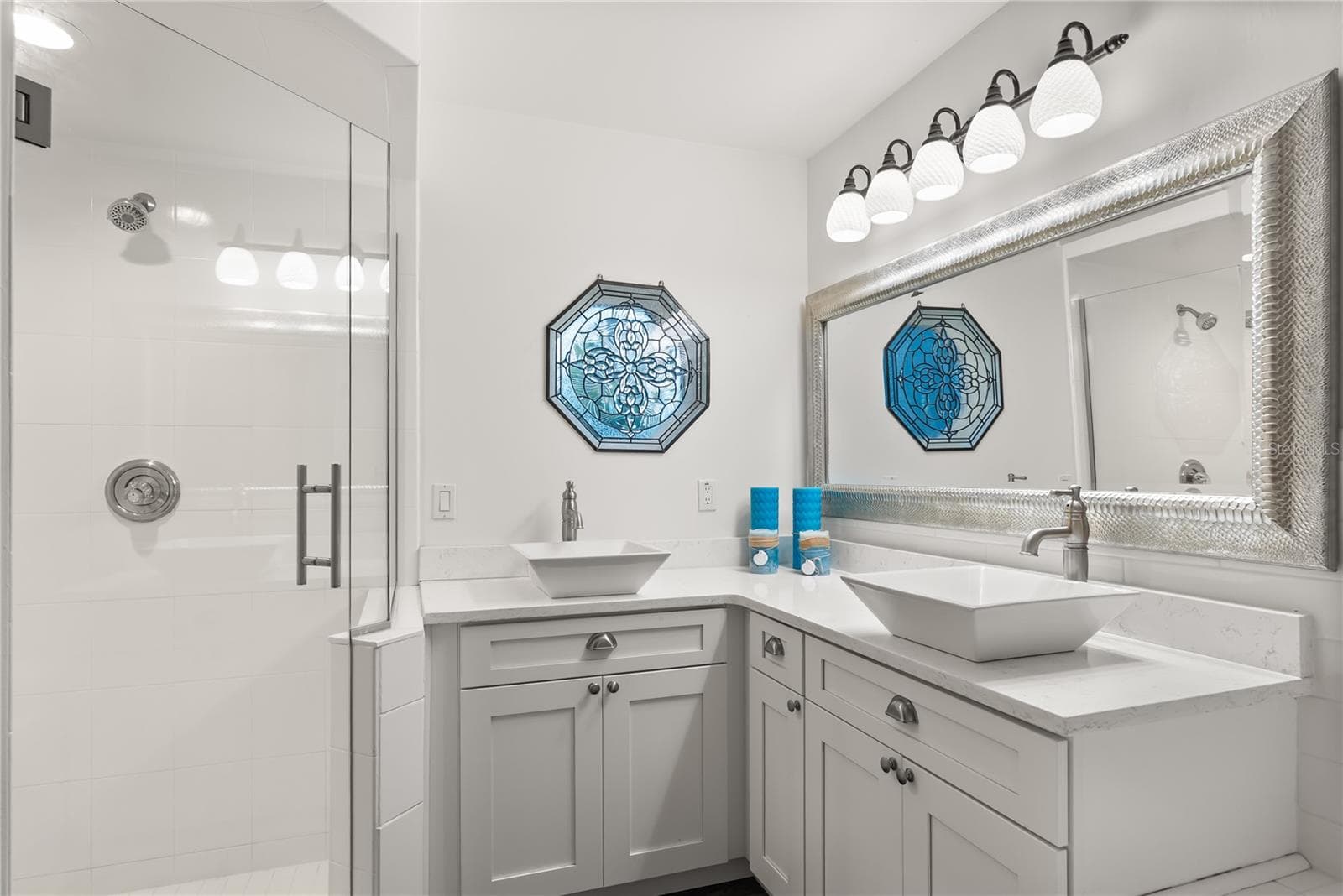 Master ensuite bathroom with updated finishes and statement window and skylight - 2707 S ATLANTIC AVE, DAYTONA BEACH SHORES