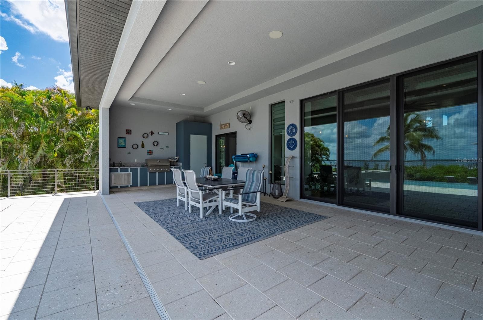 35ft covered Lanai with outdoor kitchen - 25462 SHORE DR, PUNTA GORDA