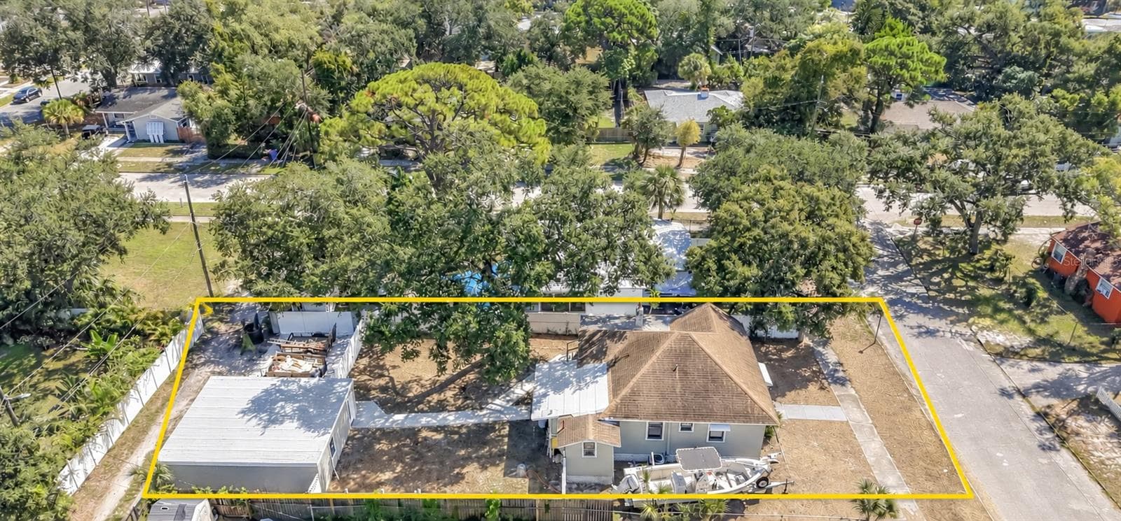 Large Lot with a rare detached 2 car garage with alley access and additional parking - Property boundaries shown are approximate and for illustrative purposes only. Buyer and Buyer's Agent are responsible for independently verifying all property lines, lot dimensions, and boundaries. - 509 27TH AVE S, ST PETERSBURG