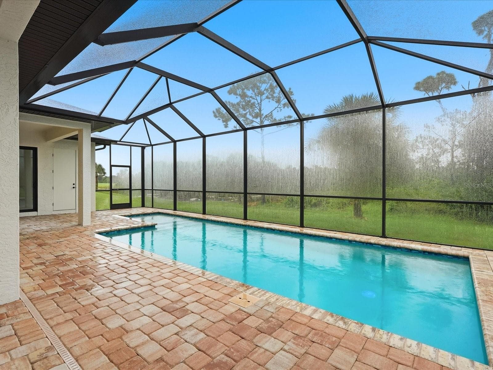 Rainy day photos will be replaced soon! - 51 LONG MEADOW PL, ROTONDA WEST