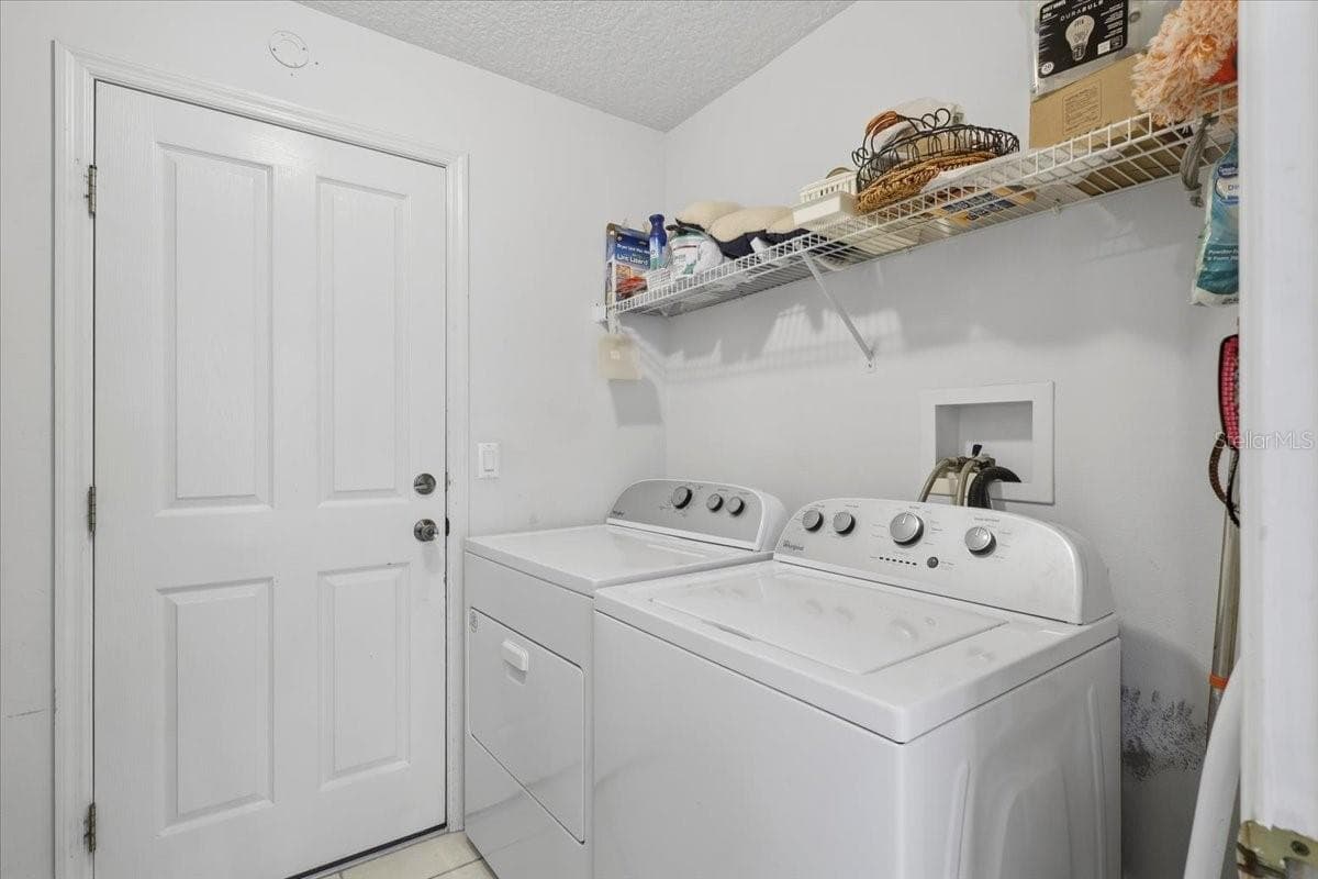Laundry room with Sink and Storage - 65 WOODBURY DR, PALM COAST