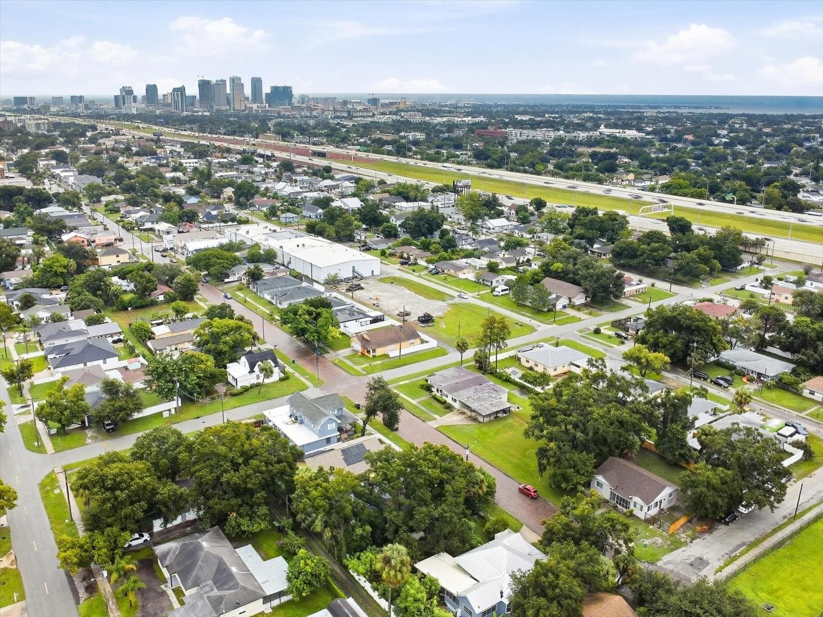 Aerial view of property and surrounding neighborhood. - 3005 W CHESTNUT ST, TAMPA