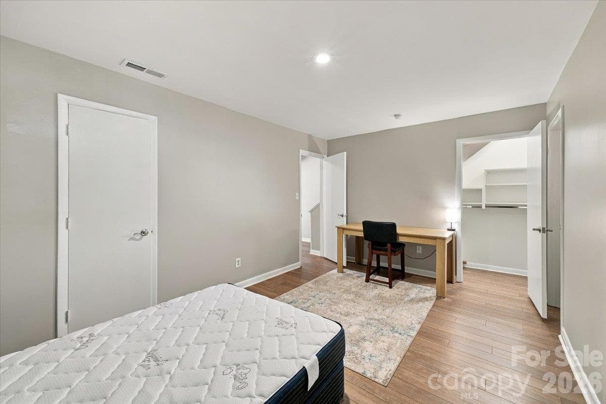 Bedroom on Basement level with ensuite and ample closet and storage - 5805 Sharon Road, Charlotte