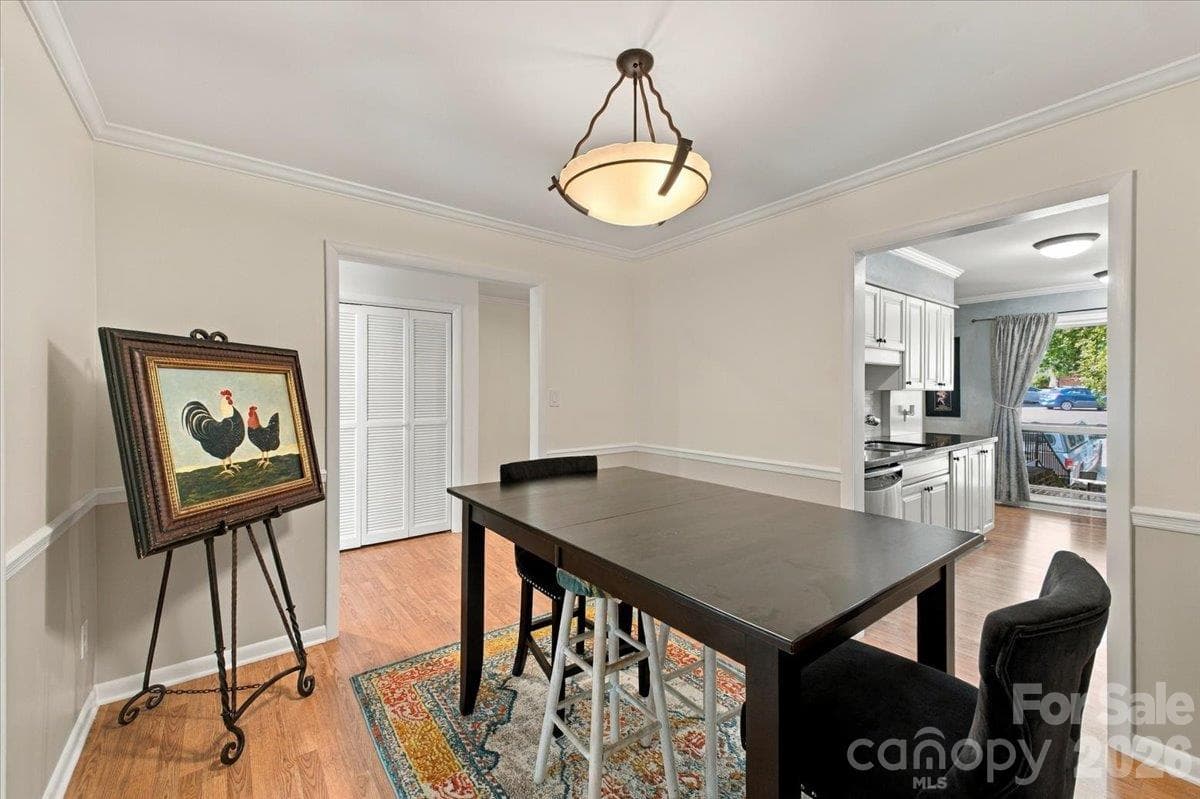 Dining room between kitchen and living room on main - 5805 Sharon Road, Charlotte