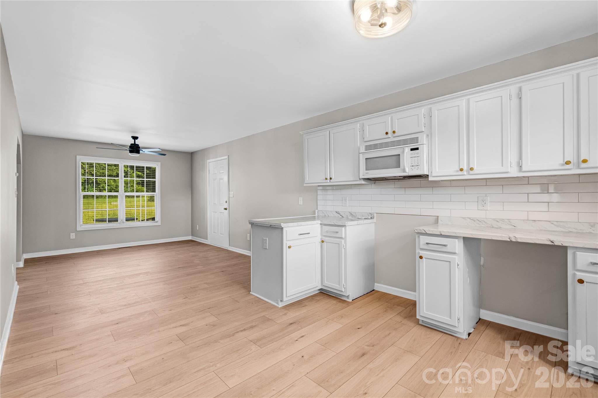 KITCHEN 2.Countertop;Calacatta3X12 subway tiles backsplash - 2065 Gary Lane, Hickory