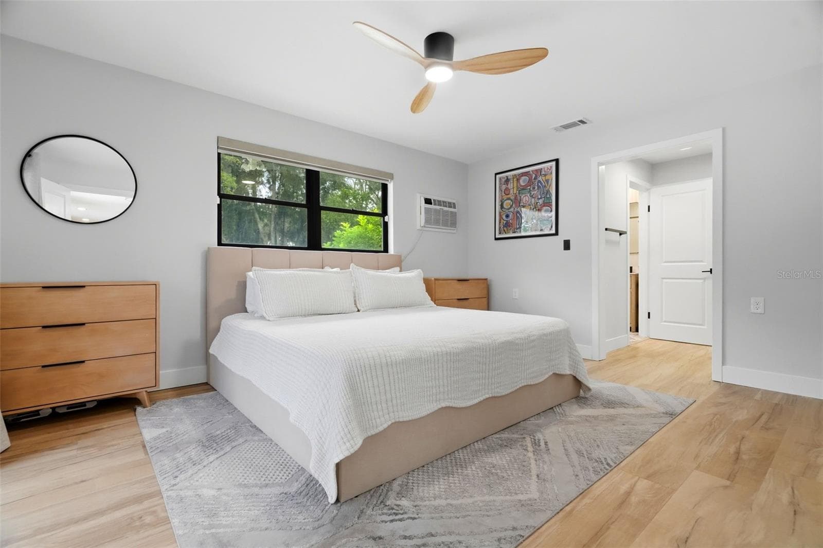 Primary Bedroom with Electronic Blinds & Extra window AC for those who like it extra cold at night! - 330 PATICA RD NE, ST PETERSBURG