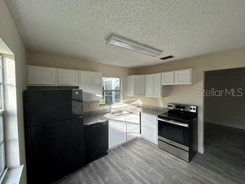 kitchen view 1 - 7607 COMO DR, NEW PORT RICHEY