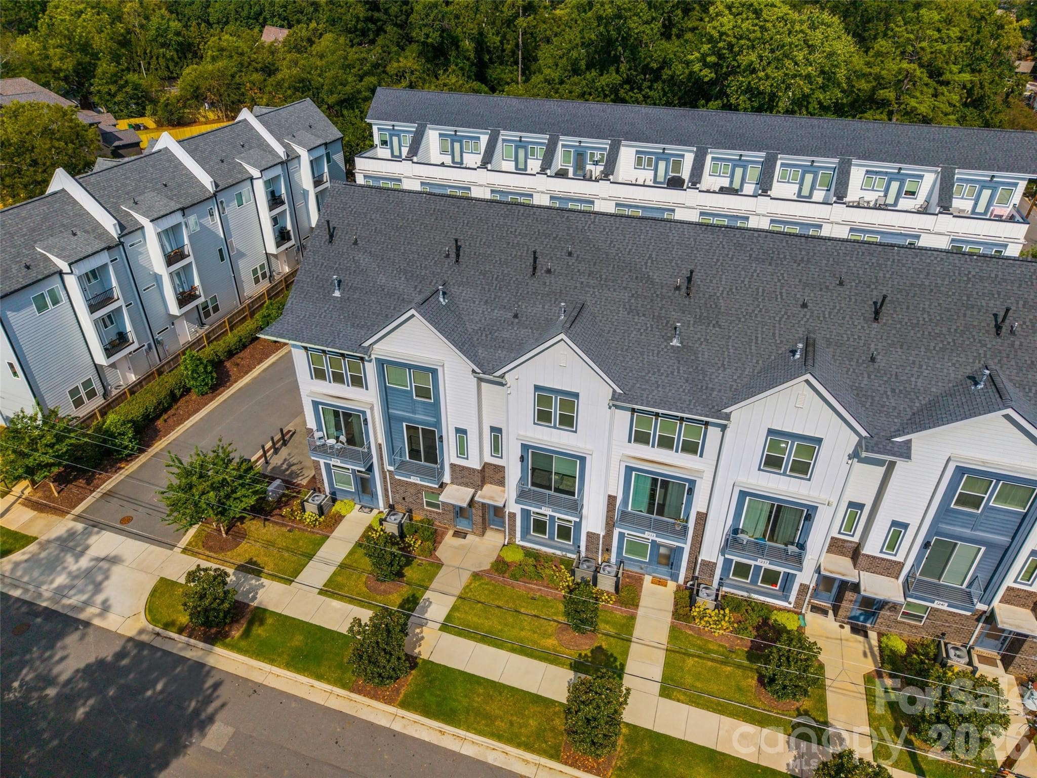 Aerial view showing the front of the townhomes - 1229 Lomax Avenue, Charlotte