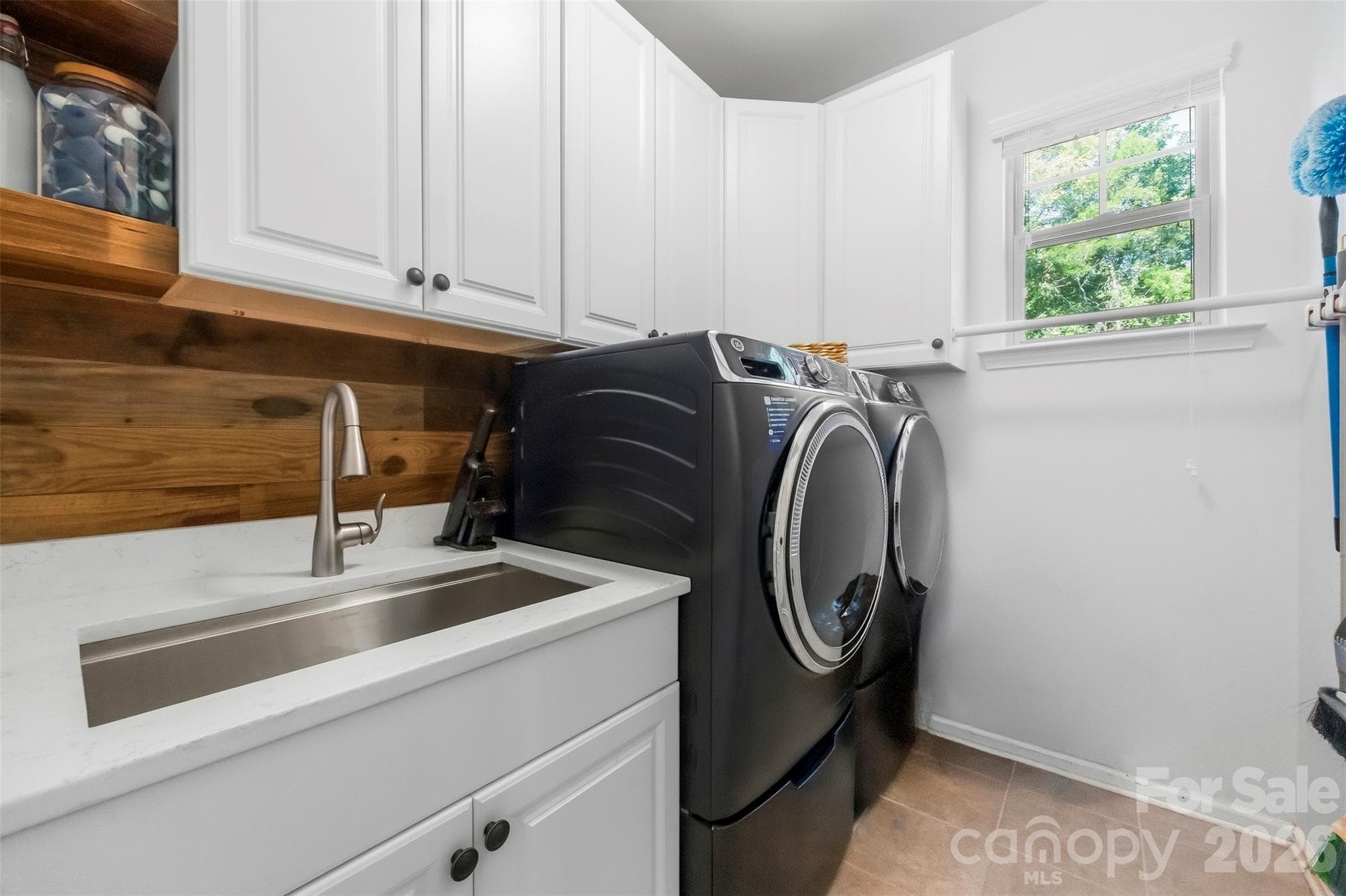 Upgraded laundry on main floor. - 821 Spelman Drive, Indian Land