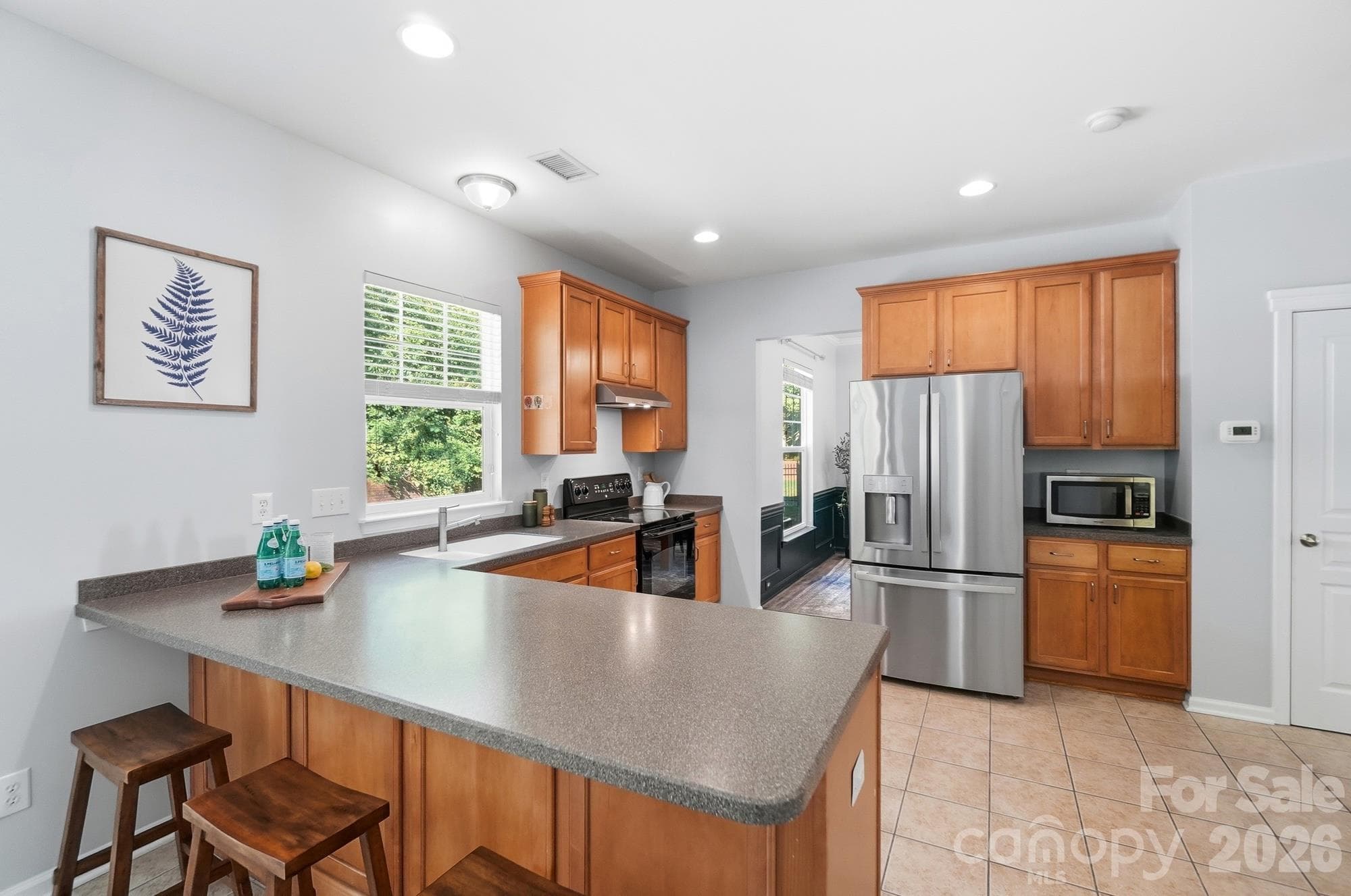 Kitchen with Breakfast Bar - 10329 Misty Moss Court, Mint Hill