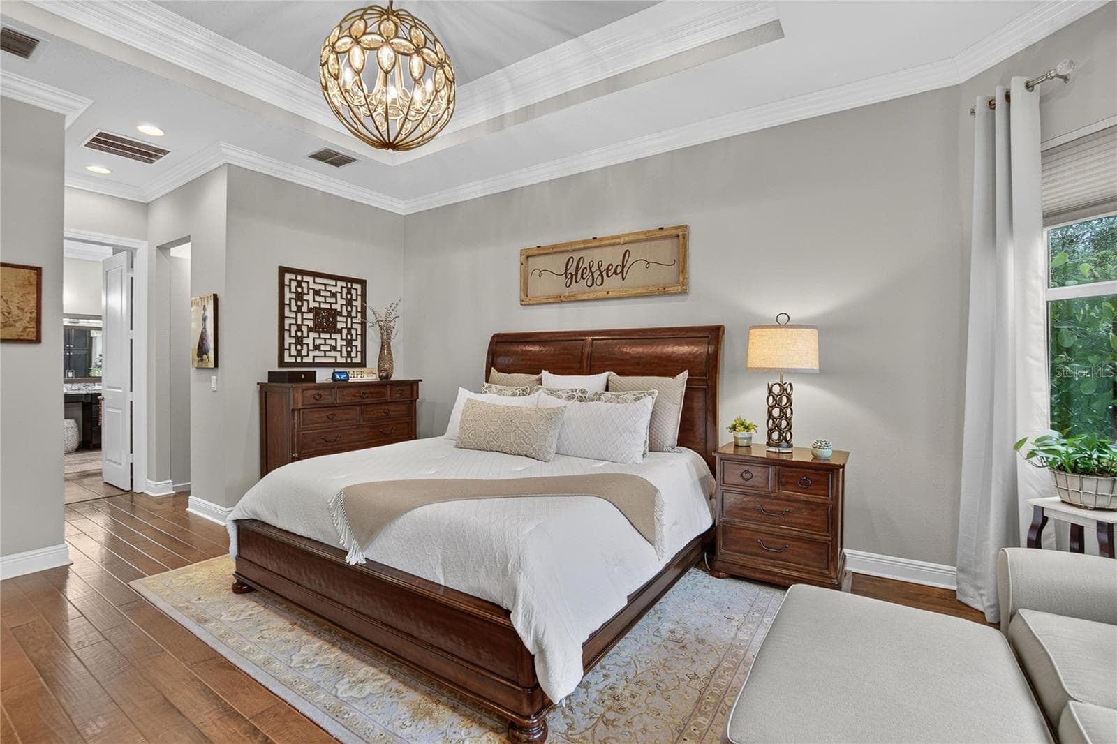 Primary Ensuite Bedroom w/Sitting Area & Upgraded Crown Molding - 5002 EMERALD ISLE DR, WIMAUMA