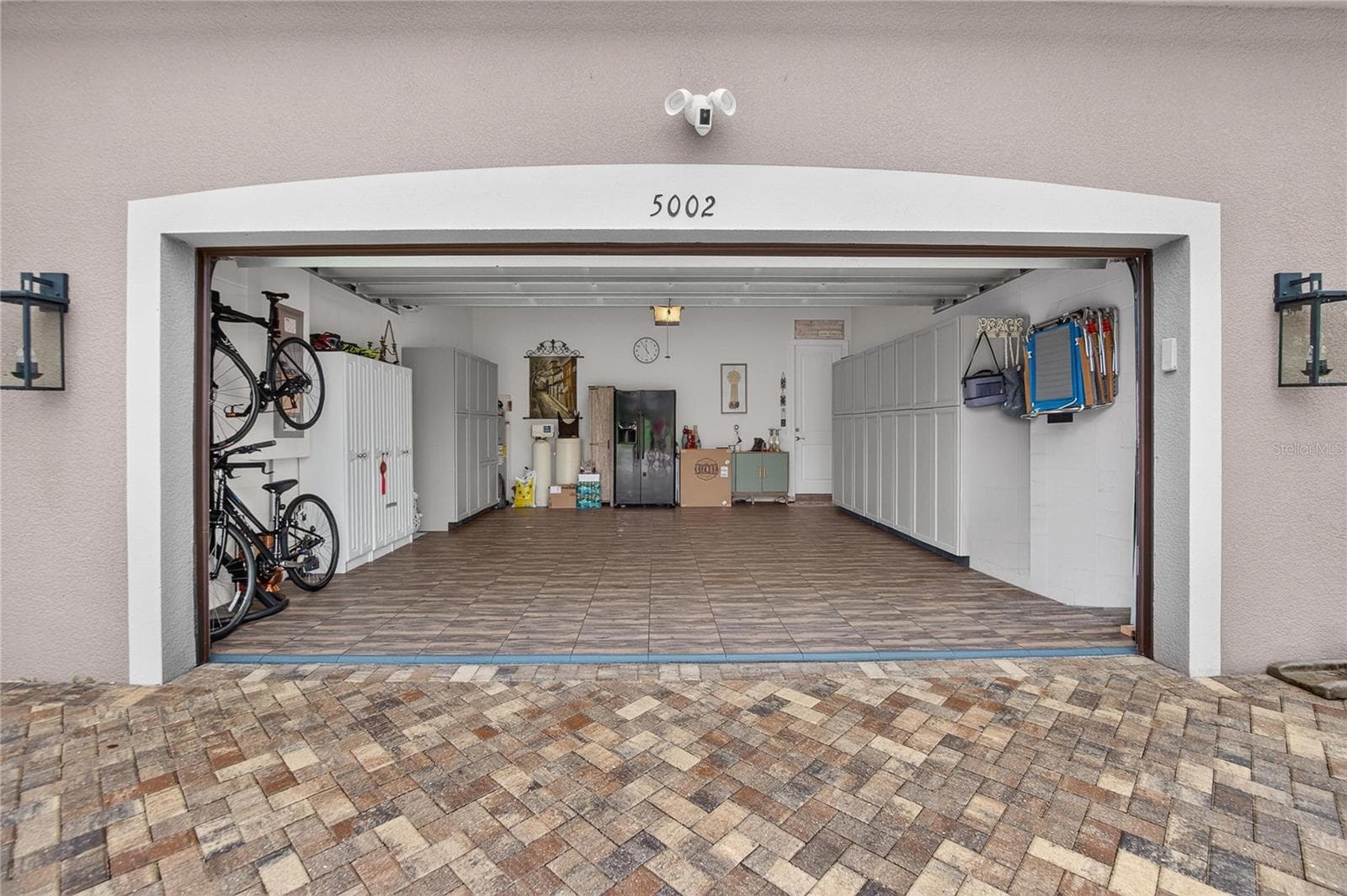 Air Conditioned Two-Car Garage with LVP Garage Flooring & Insulated Garage Door - 5002 EMERALD ISLE DR, WIMAUMA