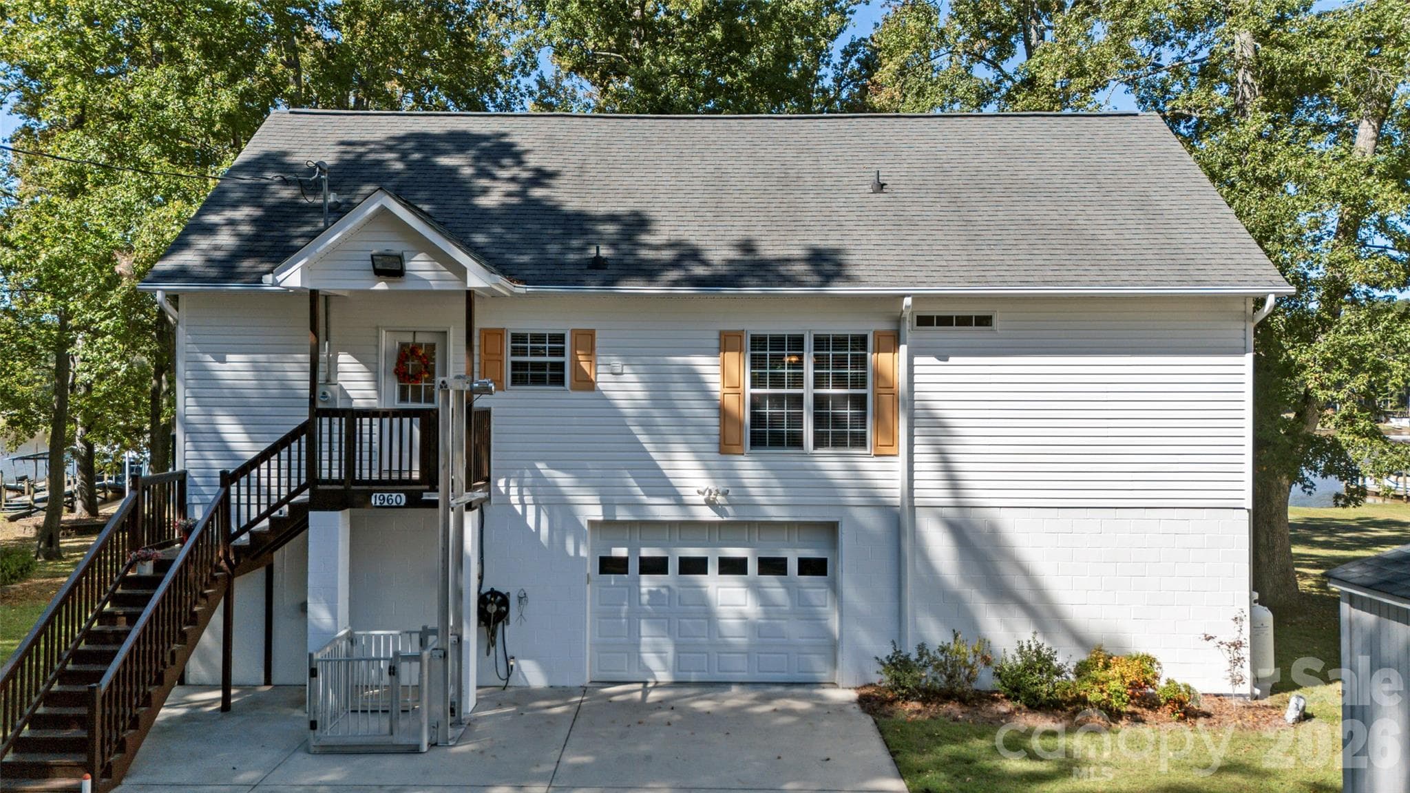 Front of home with cargo lift. - 1960 White Road, Camden