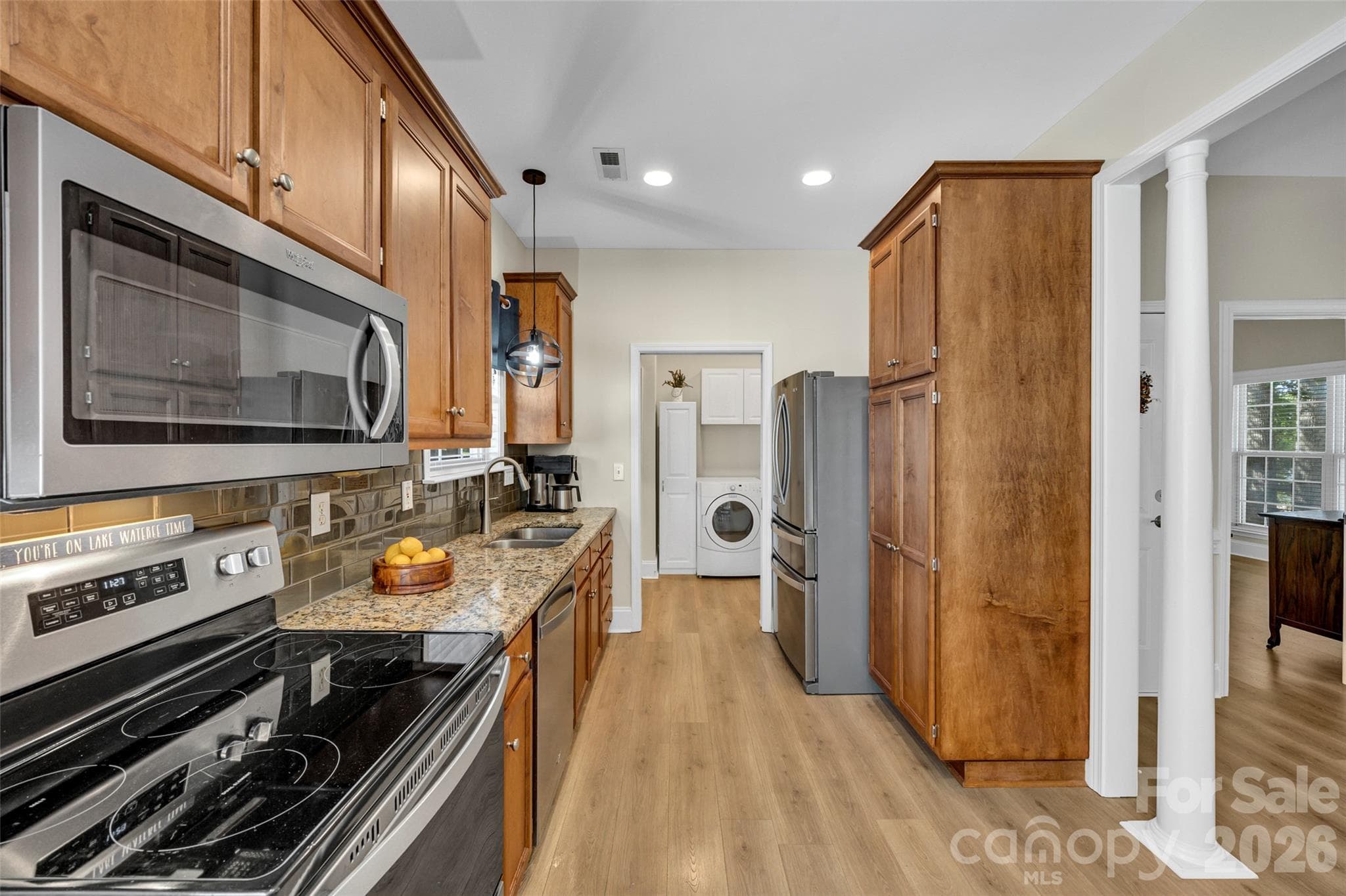 Kitchen overlooking laundry room - 1960 White Road, Camden