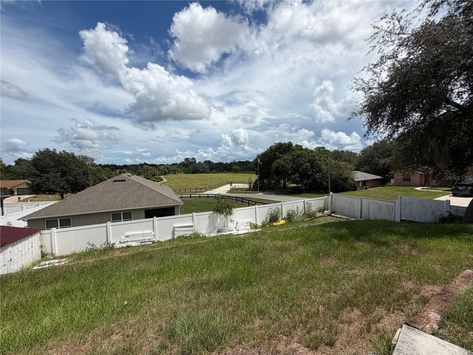 Fenced back yard - 1830 SPRINGWOOD LN, DELTONA