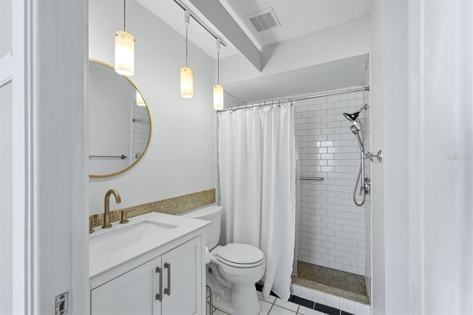 Hall Bathroom/Walk-in shower/ Door to second bedroom - 2906 63RD ST W #206, BRADENTON