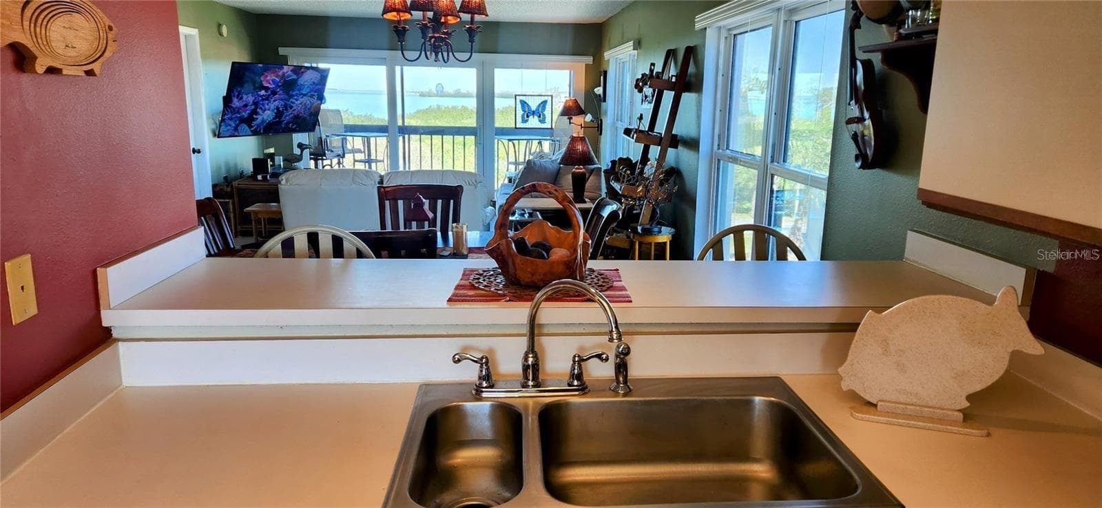 You also have a great Gulf view from the kitchen. Preparing a fresh seafood dinner with this view, makes it taste even better! - 1806 MARINER DR #318, TARPON SPRINGS
