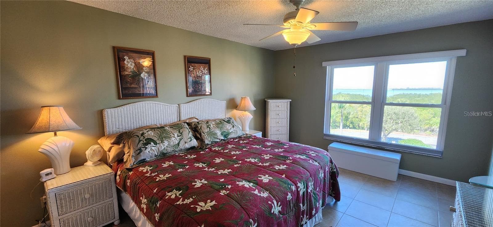 The large primary bedroom has the gulf view. - 1806 MARINER DR #318, TARPON SPRINGS