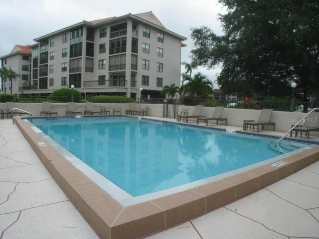 One of the two pools, is just steps from your building. - 1806 MARINER DR #318, TARPON SPRINGS