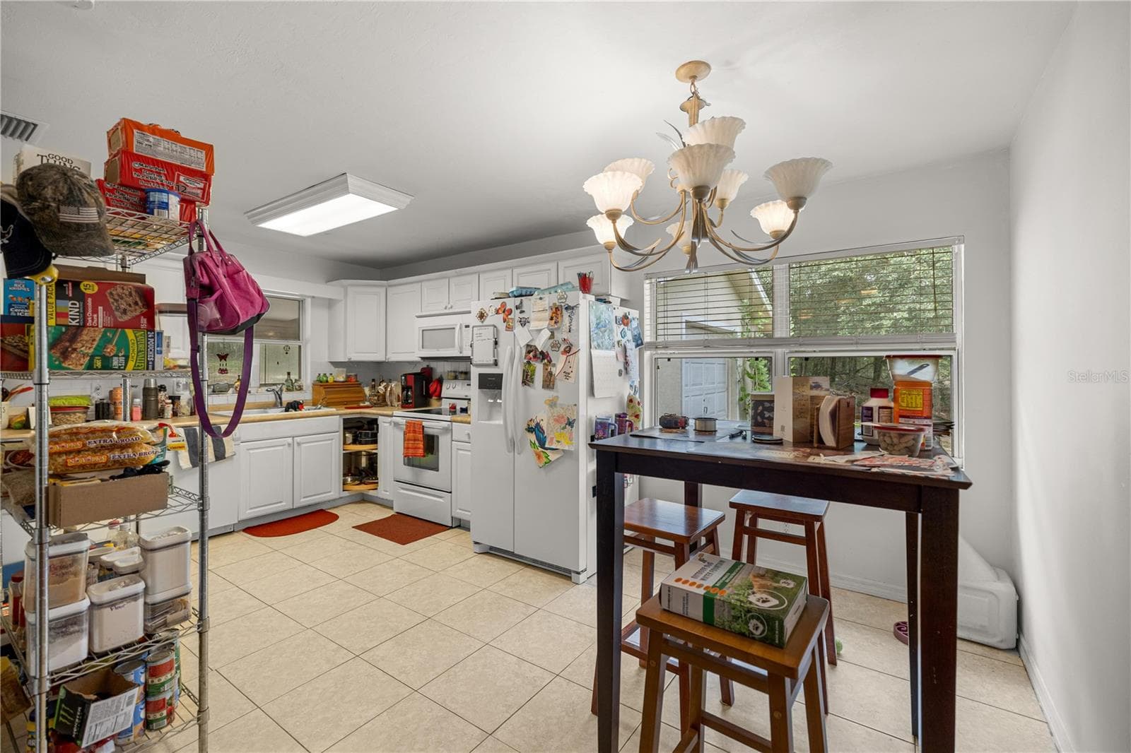 FROM LIVING ROOM THRU "EAT IN" TO  KITCHEN - 7910 SW 202ND CT, DUNNELLON