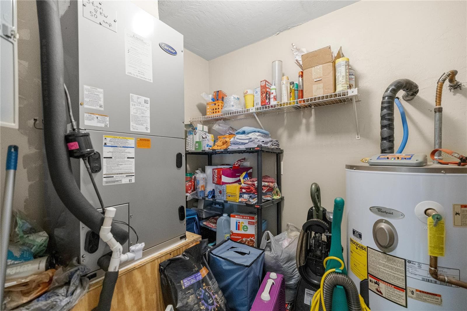 LIVING AREA STORAGE WATER HTR & AC CLOSET - 7910 SW 202ND CT, DUNNELLON