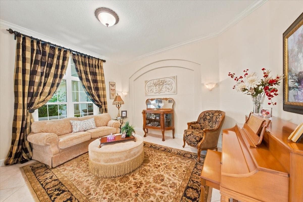 Dedicated formal living space offers an elegant setting for conversation and relaxation. - 5513 KEELER OAK ST, LITHIA