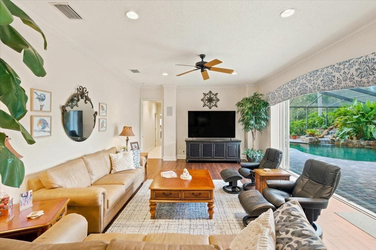Spacious family room connects seamlessly with the kitchen and outdoor living areas. - 5513 KEELER OAK ST, LITHIA