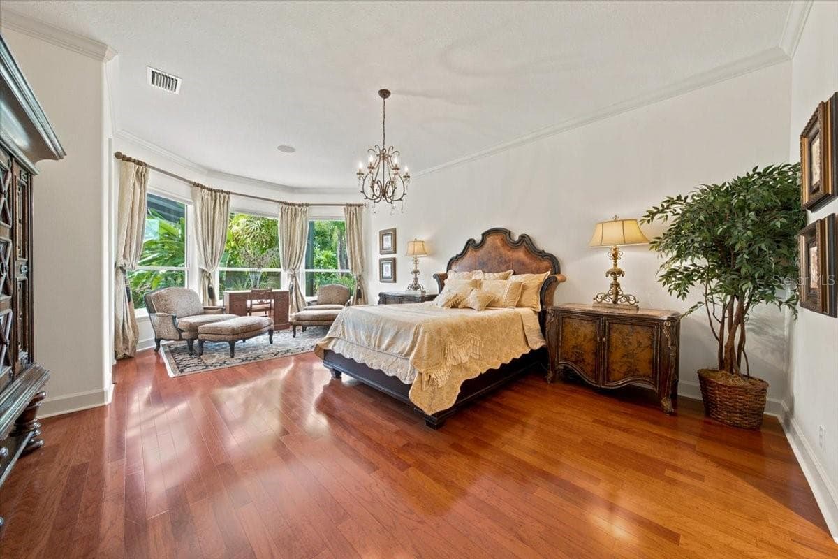 Private primary suite is thoughtfully positioned in its own wing of the home. - 5513 KEELER OAK ST, LITHIA