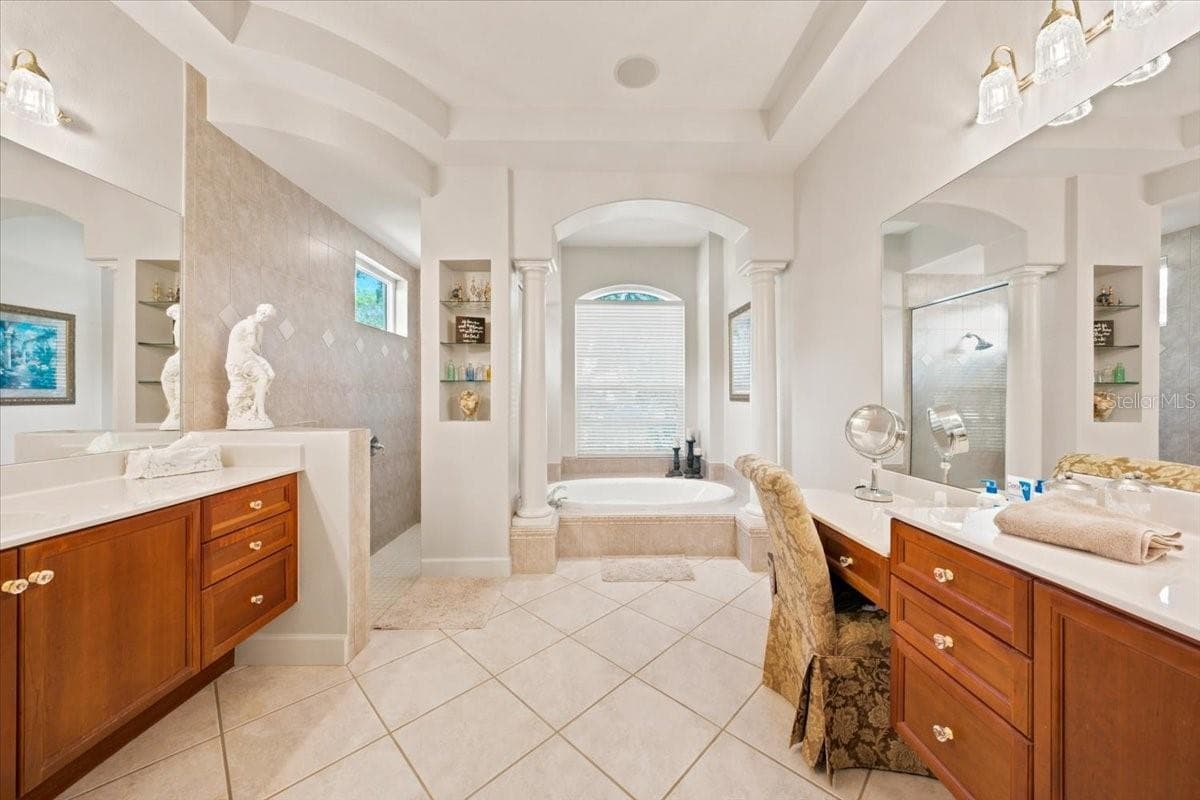 Individual vanity areas provide convenience and personal space. - 5513 KEELER OAK ST, LITHIA