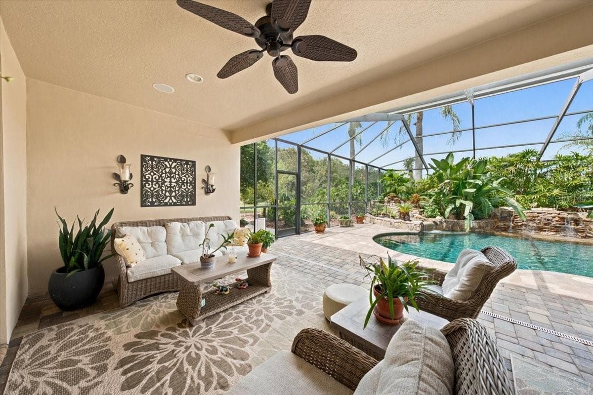 Generous screened lanai creates an impressive extension of the home's indoor living areas. - 5513 KEELER OAK ST, LITHIA