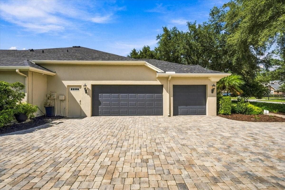 Spacious side-entry three-car garage enhances convenience and curb appeal. - 5513 KEELER OAK ST, LITHIA