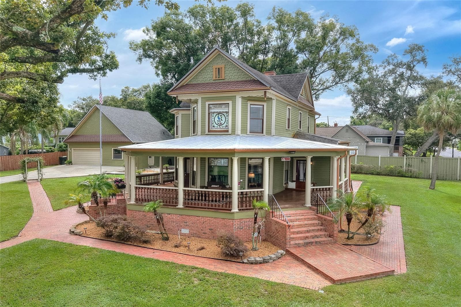 Drone view of home and detached garage - 822 W PATTERSON ST, LAKELAND
