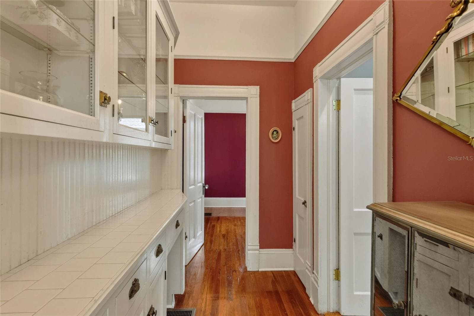 Hallway to main room and bath on 1st floor - 822 W PATTERSON ST, LAKELAND
