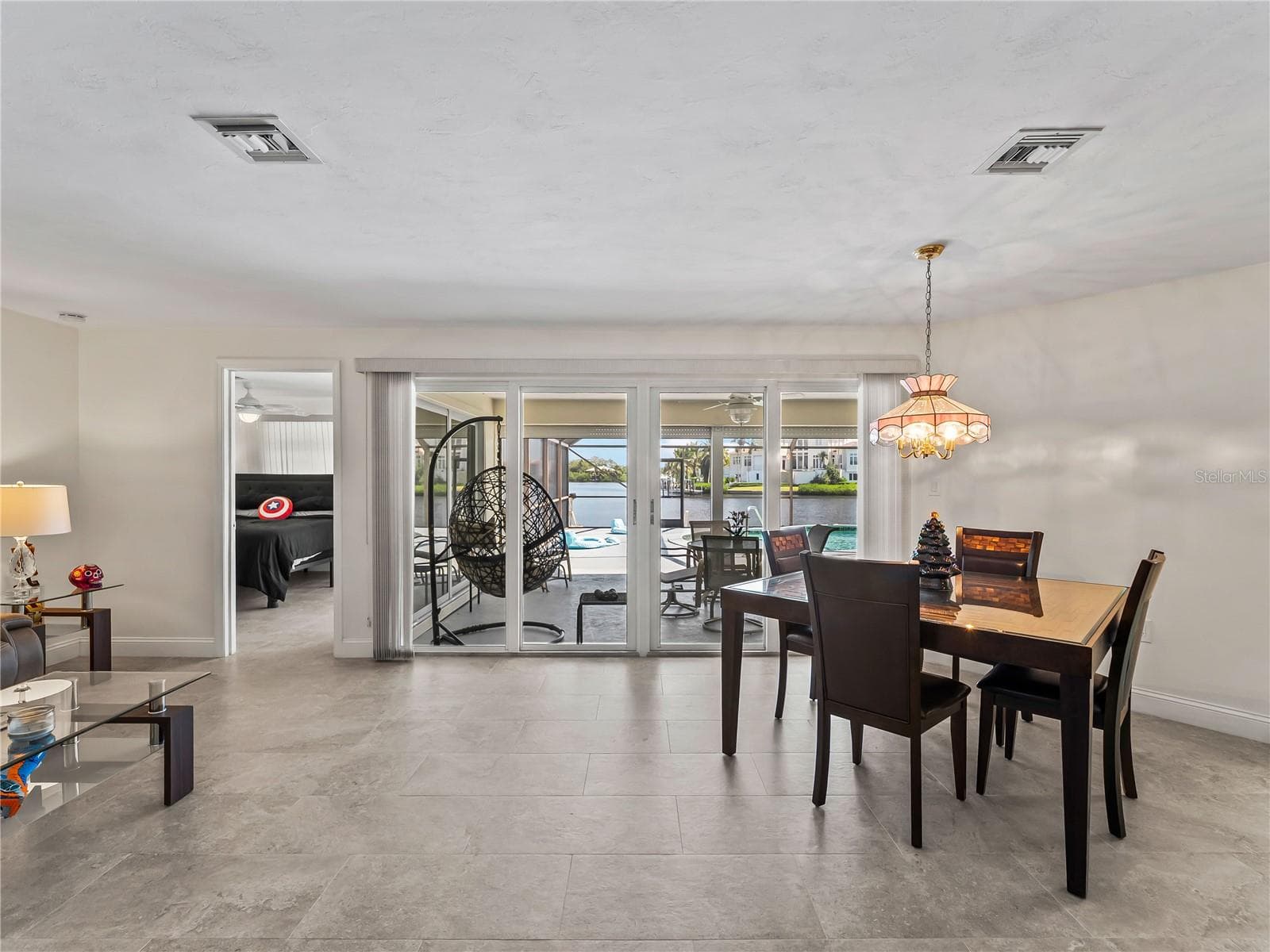 DiningLiving_2903rdStreet_BonitaSprings_OpenConcept_SliderView.jpg - 290 3RD ST W, BONITA SPRINGS