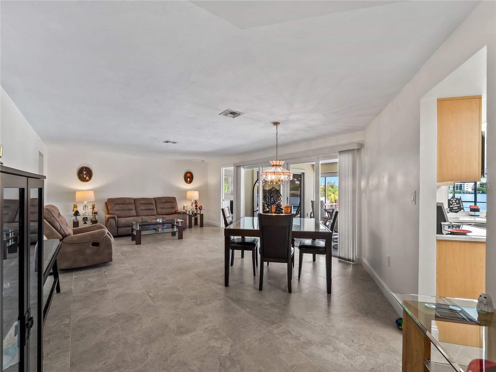 DiningLiving_2903rdStreet_BonitaSprings_OpenConcept_LanaiView.jpg - 290 3RD ST W, BONITA SPRINGS
