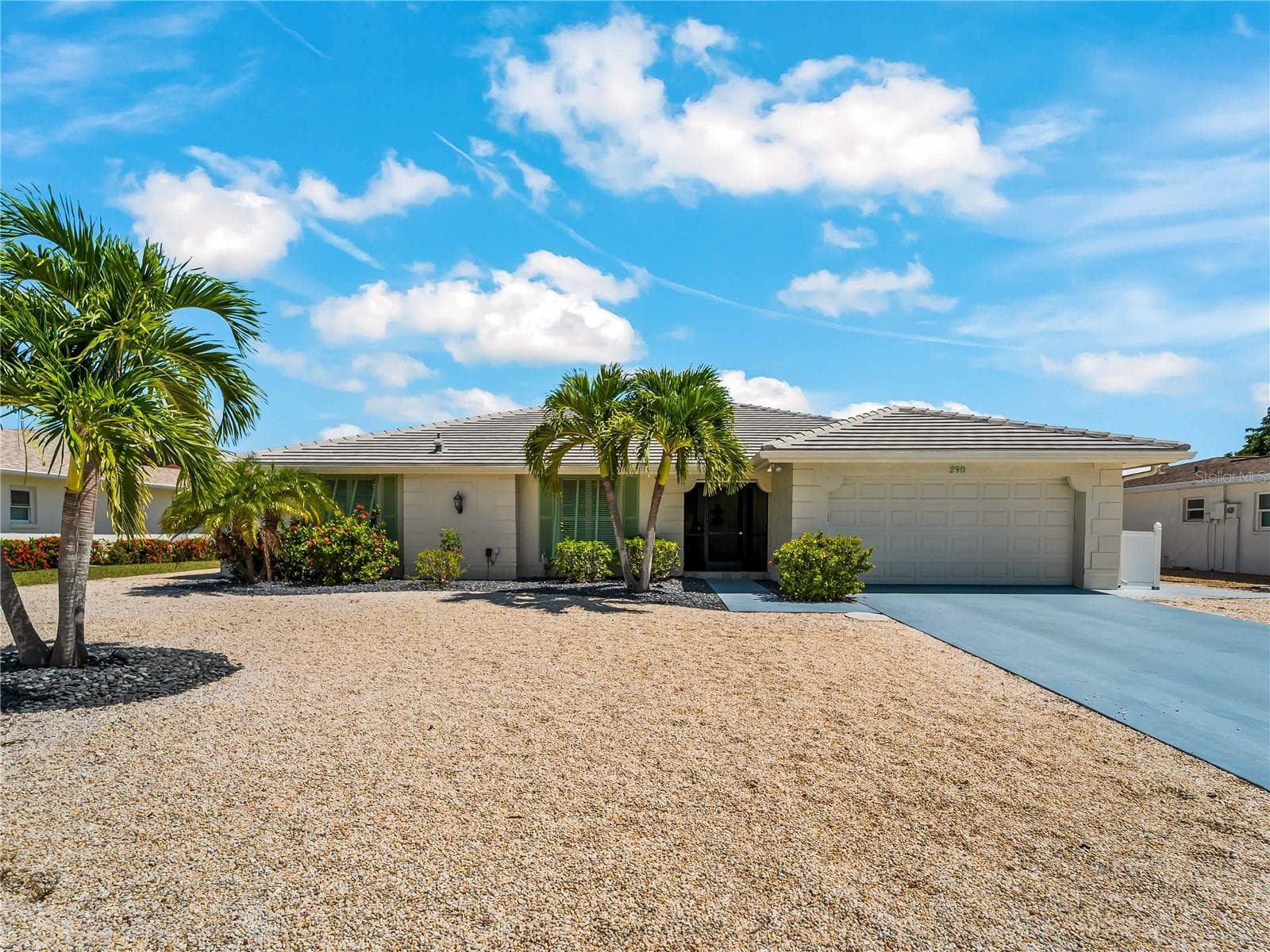 FrontExterior_2903rdStreet_BonitaSprings_TropicalLandscaping_Daylight.jpg - 290 3RD ST W, BONITA SPRINGS
