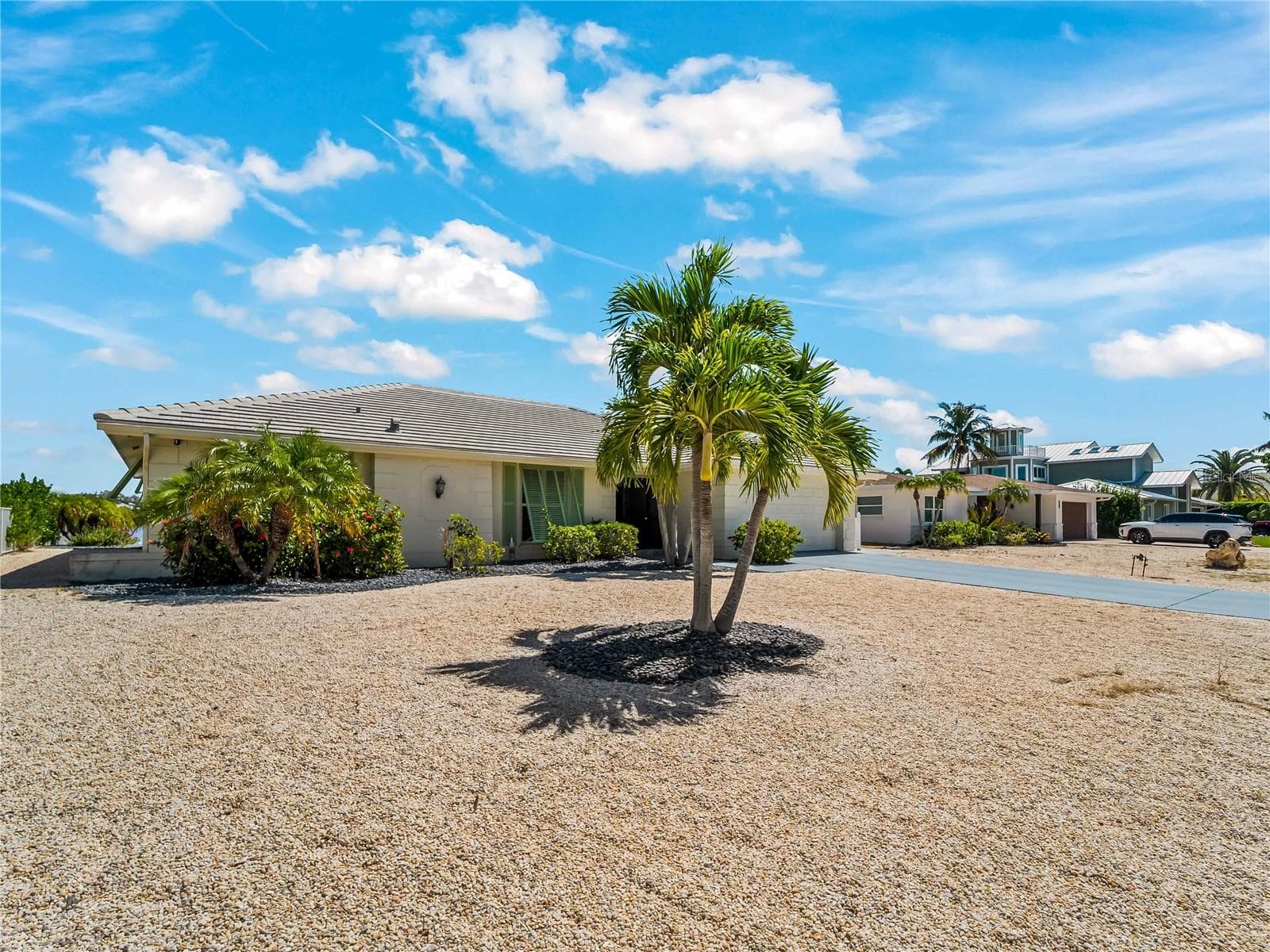 FrontExterior_2903rdStreet_BonitaSprings_TropicalLandscaping_Corner.jpg - 290 3RD ST W, BONITA SPRINGS