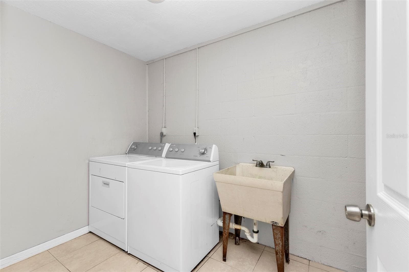 Inside laundry room off of 3rd bedroom. - 424 VANNELL ST, PORT CHARLOTTE