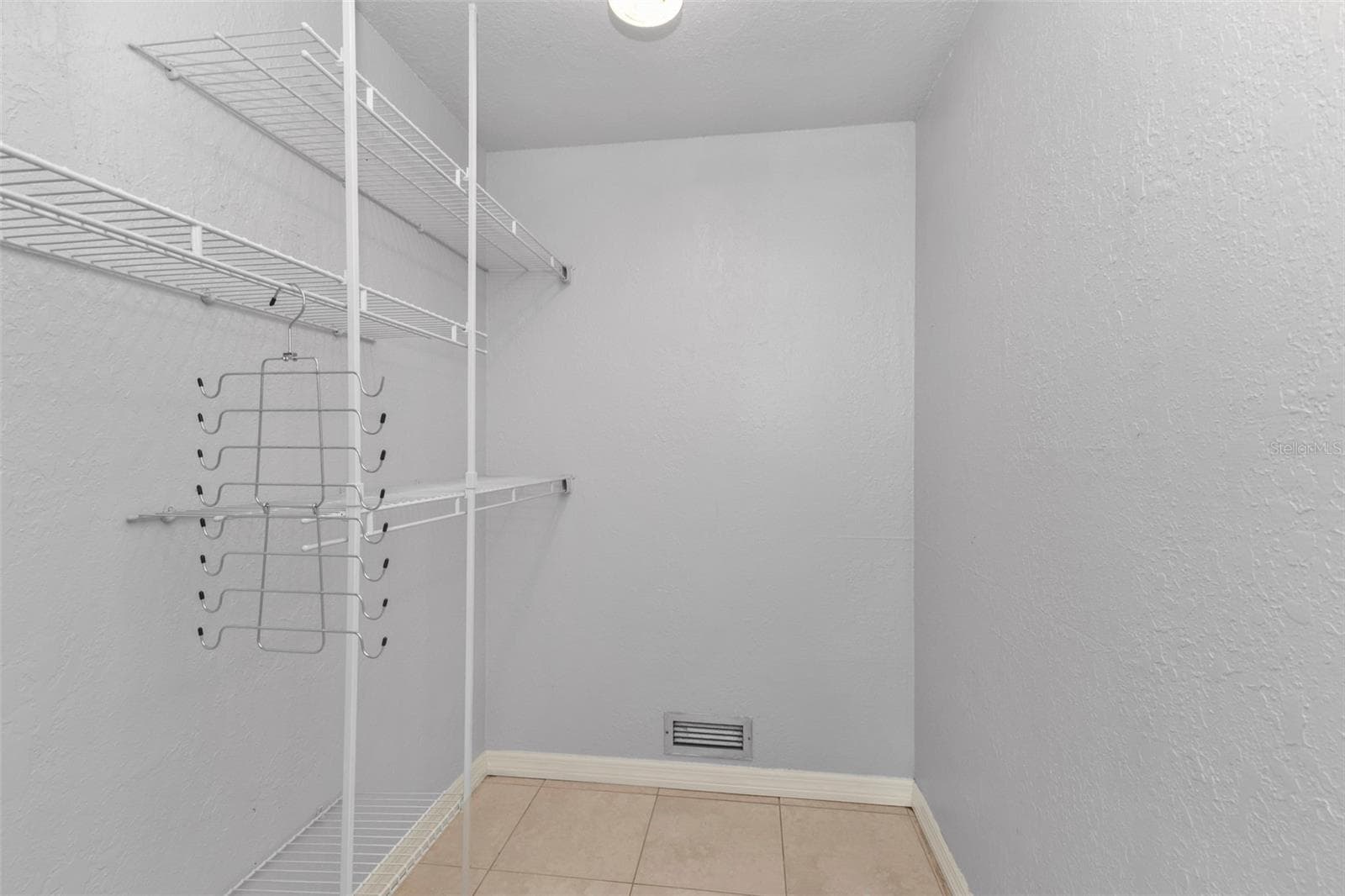 Primary walk-in- closet. - 424 VANNELL ST, PORT CHARLOTTE