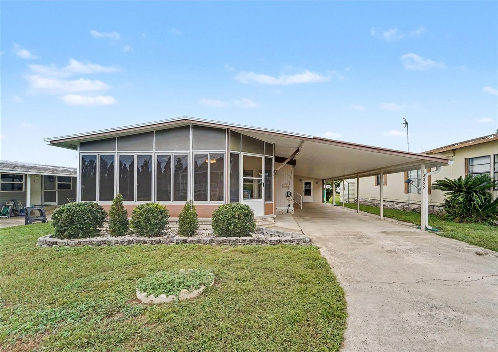 Manufactured Home at 10055 COLLINGWOOD AVE, DADE CITY, photo 2 of 30