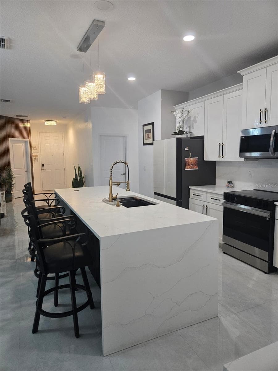 Single Family Residence at 13417 E DELAWARE AVE, ASTATULA, photo 10 of 24
